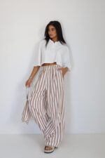 ‏מכנסיים חולצה עם תיק תואם