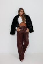 מכנס עור בורדו ניטים